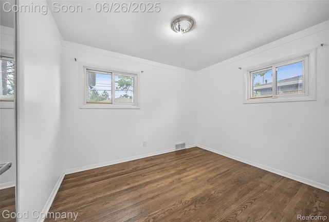 26730 W Davison, Redford, MI 48239 - unfurnished room with dark wood-style floors and crown molding