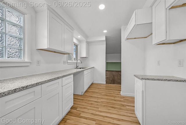 26730 W Davison, Redford, MI 48239 - kitchen featuring recessed lighting, light wood-style floors, white cabinetry, and light stone counters