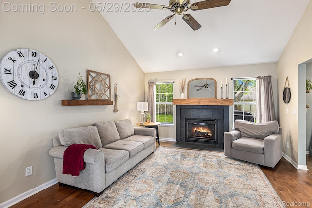 1411 Vollar Dr, Flint, MI 48532 - living area with a ceiling fan, vaulted ceiling, baseboards, wood finished floors, and a tile fireplace