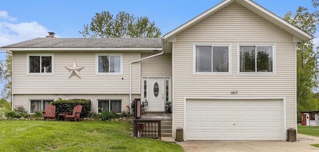 1977 Shipman Rd, Oxford, MI 48371 - raised ranch featuring an attached garage, a front lawn, driveway, and a chimney