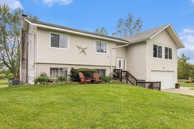 1977 Shipman Rd, Oxford, MI 48371 - view of front facade featuring a chimney, a front lawn, and an attached garage