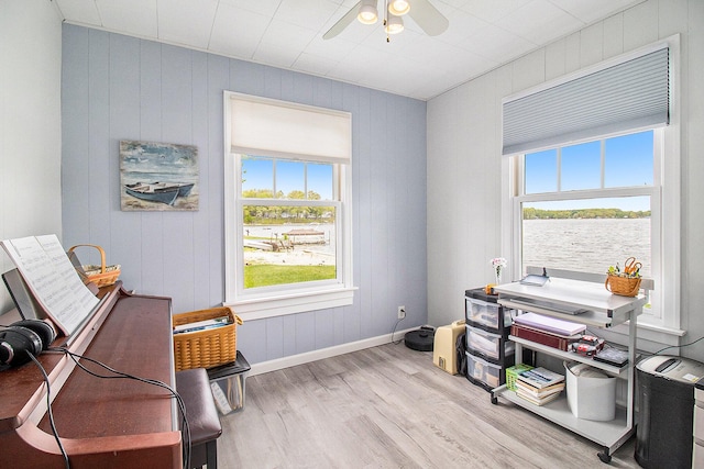 7394 N Keating Dr, Walkerville, MI 49459 - office with wood finished floors, a ceiling fan, and baseboards