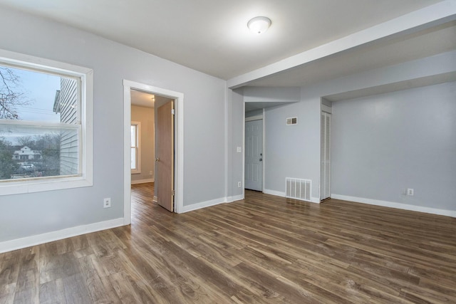407 11th St NW Unit 409, Grand Rapids, MI 49504 - empty room with wood finished floors and baseboards