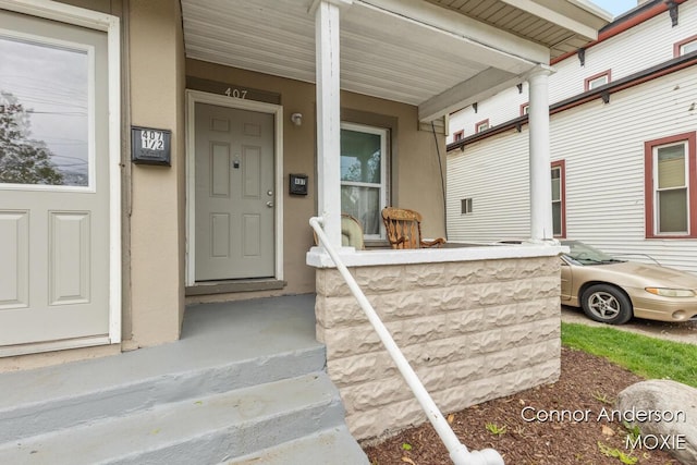 407 11th St NW Unit 409, Grand Rapids, MI 49504 - view of exterior entry with covered porch