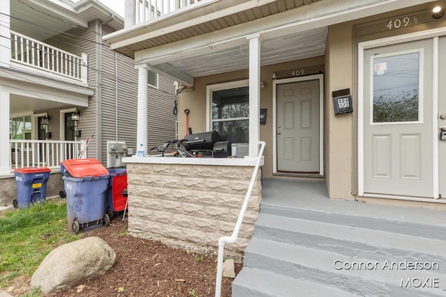 407 11th St NW Unit 409, Grand Rapids, MI 49504 - view of exterior entry with covered porch
