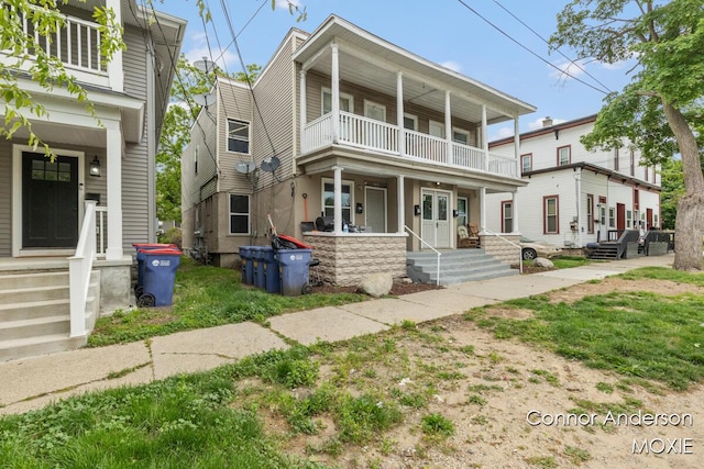 407 11th St NW Unit 409, Grand Rapids, MI 49504 - view of front of property featuring a balcony and covered porch