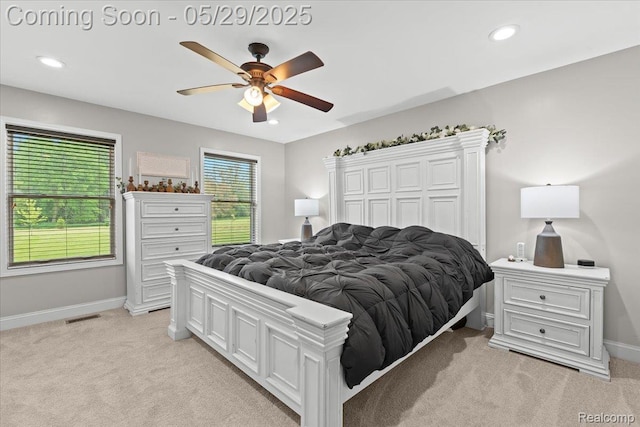 6035 Beard Rd, Byron, MI 48418 - bedroom with light colored carpet, baseboards, a ceiling fan, and recessed lighting