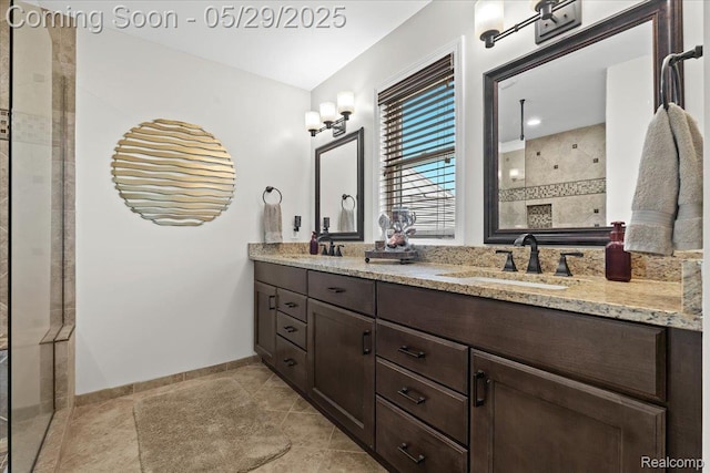 6035 Beard Rd, Byron, MI 48418 - bathroom with baseboards, double vanity, and tiled shower