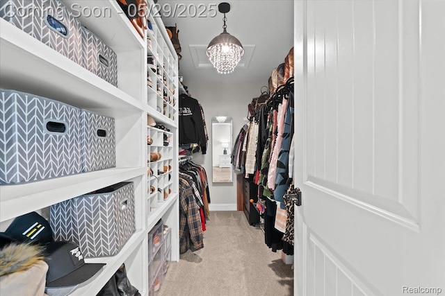 6035 Beard Rd, Byron, MI 48418 - spacious closet with carpet floors and a chandelier