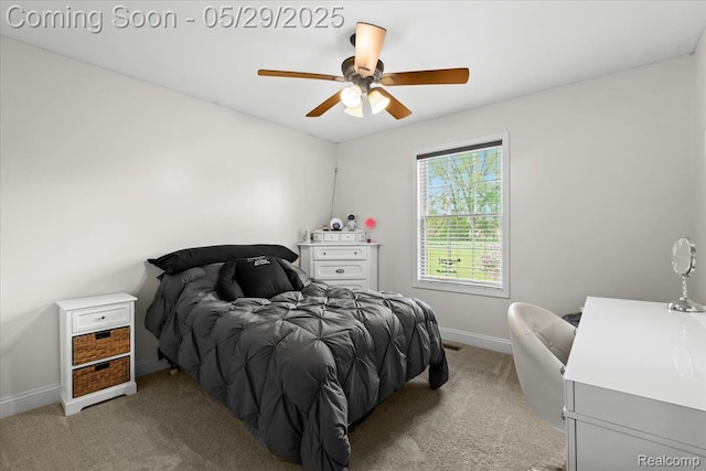 6035 Beard Rd, Byron, MI 48418 - bedroom with baseboards, light carpet, and a ceiling fan