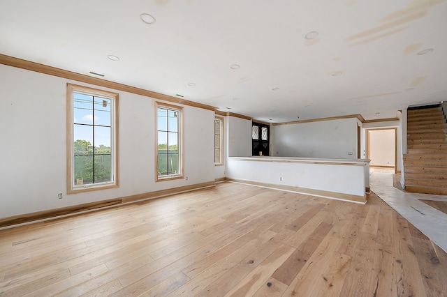 1395 Northlawn Blvd, Birmingham, MI 48009 - unfurnished living room with crown molding, light wood-style flooring, stairs, baseboards, and recessed lighting