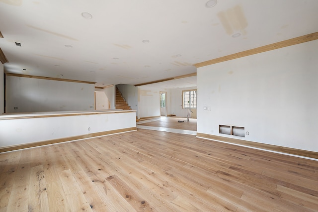 1395 Northlawn Blvd, Birmingham, MI 48009 - unfurnished room with stairs, light wood-style floors, crown molding, and baseboards