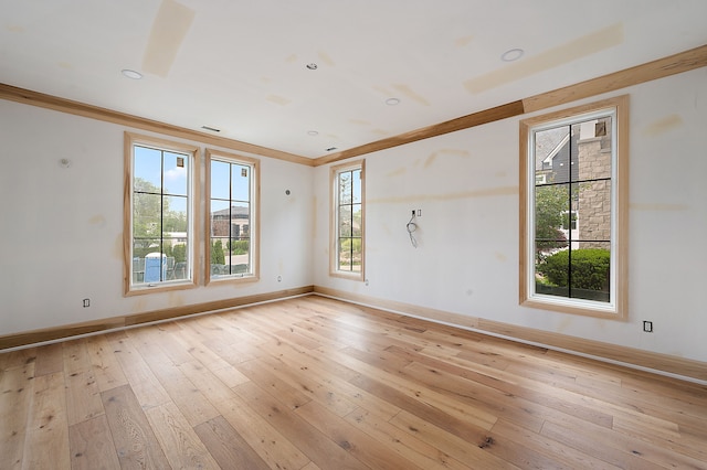 1395 Northlawn Blvd, Birmingham, MI 48009 - empty room featuring crown molding, baseboards, and light wood finished floors