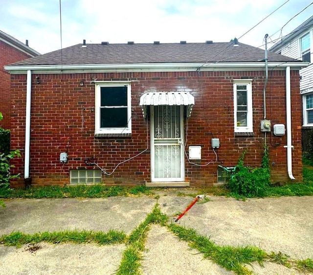 8603 Whitcomb St, Detroit, MI 48228 - view of front facade featuring brick siding and a shingled roof