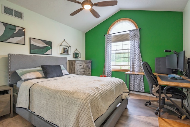 2363 Sundance Rdg, Howell, MI 48843 - bedroom featuring wood finished floors, lofted ceiling, a desk, and a ceiling fan