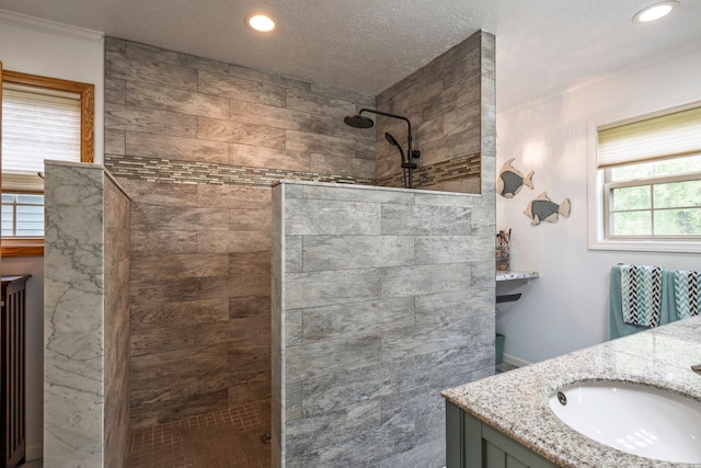 2363 Sundance Rdg, Howell, MI 48843 - full bathroom with walk in shower, vanity, recessed lighting, and a textured ceiling