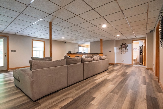 2363 Sundance Rdg, Howell, MI 48843 - living room with wood finished floors, baseboards, healthy amount of natural light, and recessed lighting