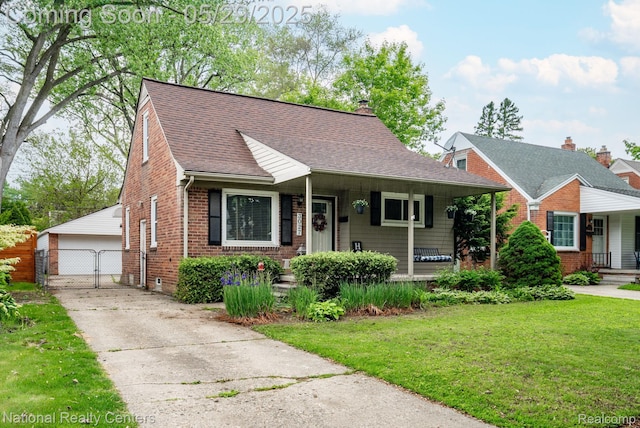 3027 Ferris Ave, Royal Oak, MI 48073 - bungalow with a porch, brick siding, a shingled roof, and a garage