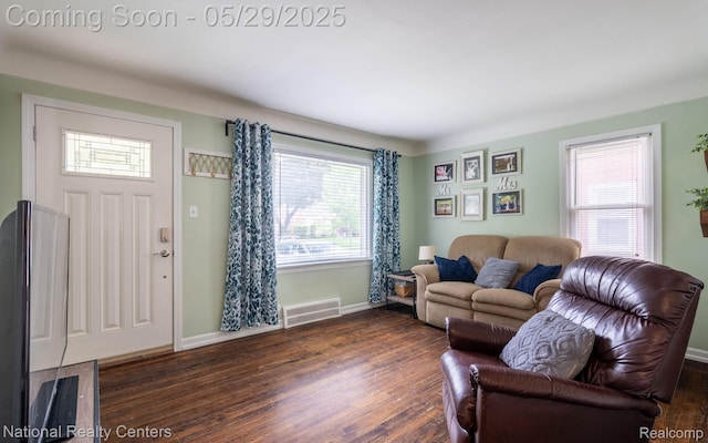 3027 Ferris Ave, Royal Oak, MI 48073 - living room with healthy amount of natural light, dark wood-style floors, and baseboards