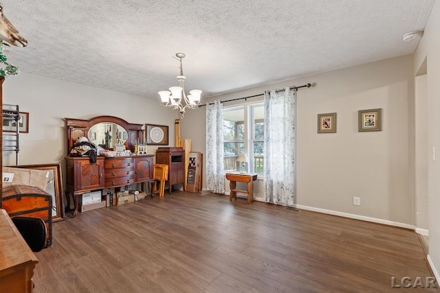 10623 Springville Hwy, Onsted, MI 49265 - office area with a textured ceiling, a chandelier, wood finished floors, and baseboards