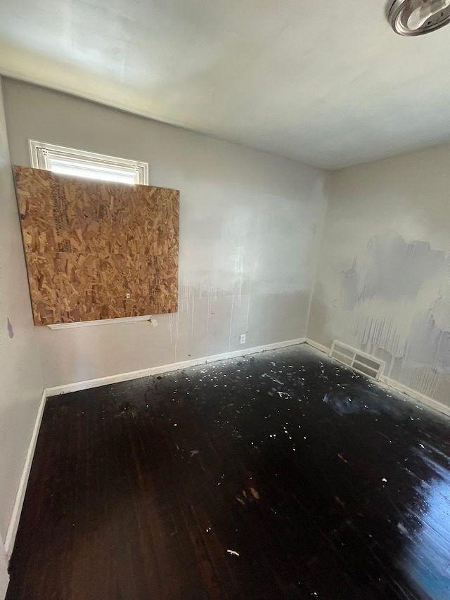 16500 Eastburn St, Detroit, MI 48205 - empty room with baseboards and hardwood / wood-style floors