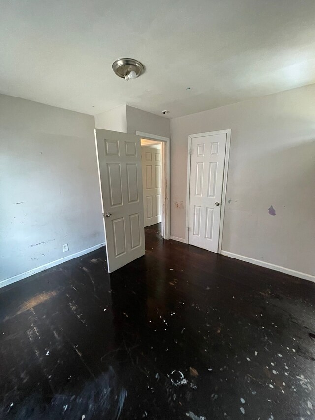 16500 Eastburn St, Detroit, MI 48205 - empty room with baseboards and wood finished floors