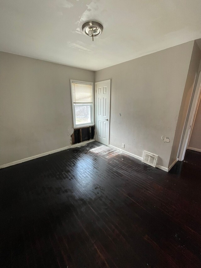 16500 Eastburn St, Detroit, MI 48205 - unfurnished room featuring dark wood finished floors and baseboards