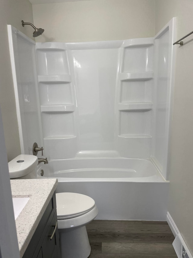 1659 Weymouth St, West Bloomfield, MI 48324 - bathroom with toilet, wood finished floors, shower / bath combination, and vanity