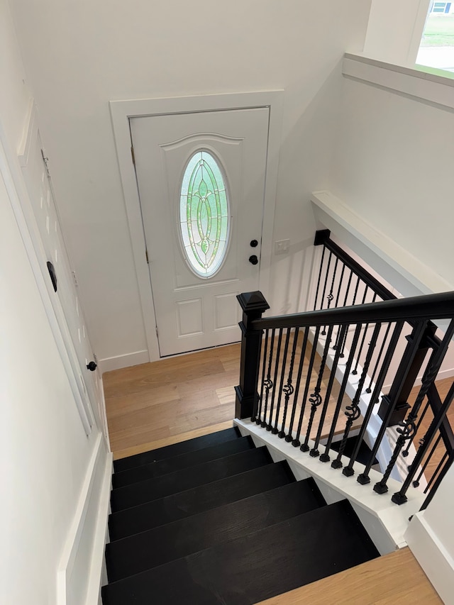 42811 Wilmington Dr, Sterling Heights, MI 48313 - staircase featuring hardwood / wood-style floors