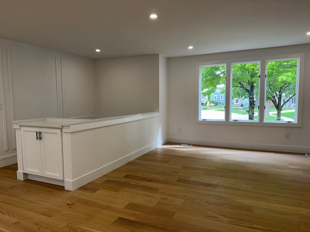 42811 Wilmington Dr, Sterling Heights, MI 48313 - empty room featuring light wood finished floors, recessed lighting, and baseboards
