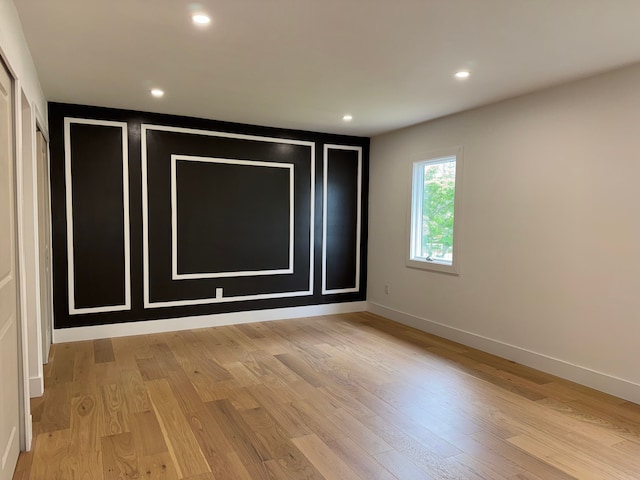 42811 Wilmington Dr, Sterling Heights, MI 48313 - unfurnished room with light wood-style flooring, baseboards, and recessed lighting