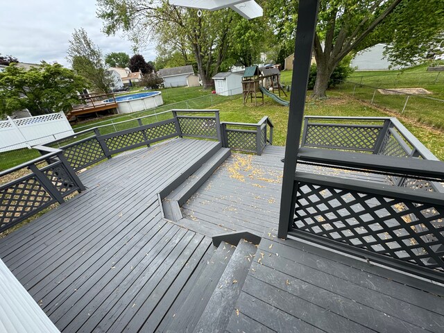 42811 Wilmington Dr, Sterling Heights, MI 48313 - wooden terrace with a playground