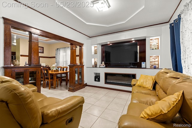 7295 Gartner St, Detroit, MI 48209 - living room featuring decorative columns, light tile patterned flooring, and a raised ceiling