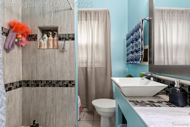 7295 Gartner St, Detroit, MI 48209 - full bathroom featuring tile patterned flooring, vanity, toilet, and a shower