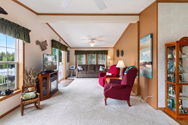 1797 Lawrence Dr, Bitely, MI 49309 - carpeted living area featuring ceiling fan, plenty of natural light, ornamental molding, and baseboards