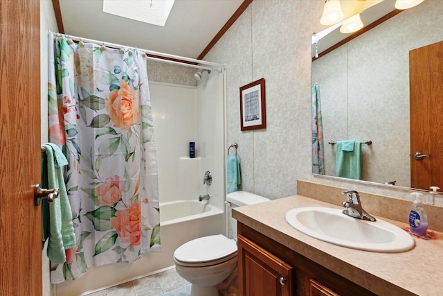1797 Lawrence Dr, Bitely, MI 49309 - bathroom featuring a skylight, shower / bathtub combination with curtain, wallpapered walls, vanity, and toilet