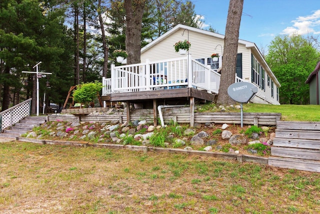 1797 Lawrence Dr, Bitely, MI 49309 - back of house featuring a wooden deck and stairway