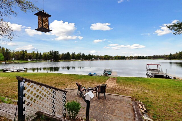 1797 Lawrence Dr, Bitely, MI 49309 - view of patio featuring a water view and a dock