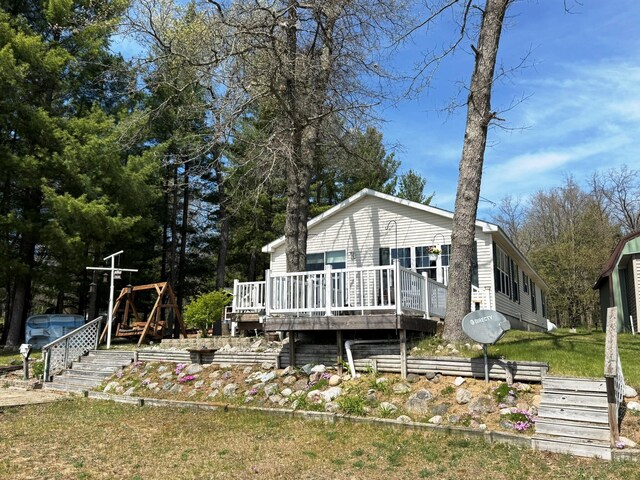 1797 Lawrence Dr, Bitely, MI 49309 - back of house with a deck