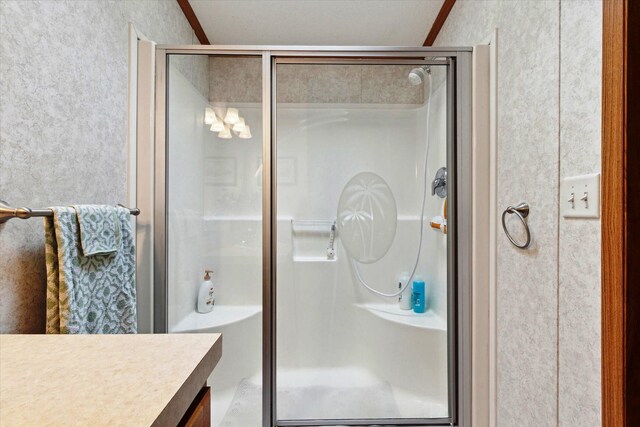 1797 Lawrence Dr, Bitely, MI 49309 - full bathroom featuring a shower stall and vanity