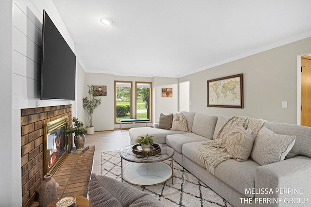 7359 Cascade Woods Dr SE, Grand Rapids, MI 49546 - living room featuring crown molding, a fireplace, wood finished floors, baseboards, and recessed lighting