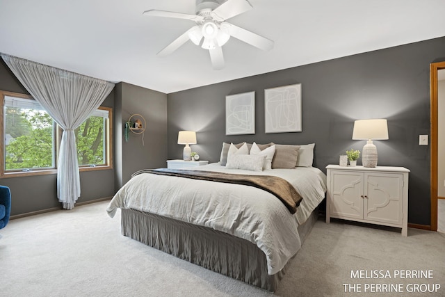 7359 Cascade Woods Dr SE, Grand Rapids, MI 49546 - carpeted bedroom with baseboards and a ceiling fan