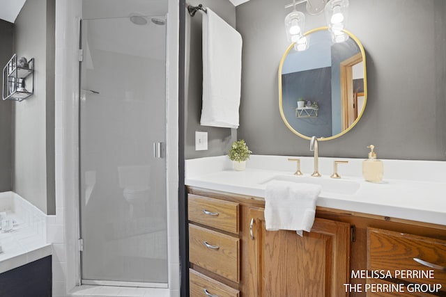 7359 Cascade Woods Dr SE, Grand Rapids, MI 49546 - bathroom featuring a stall shower and vanity