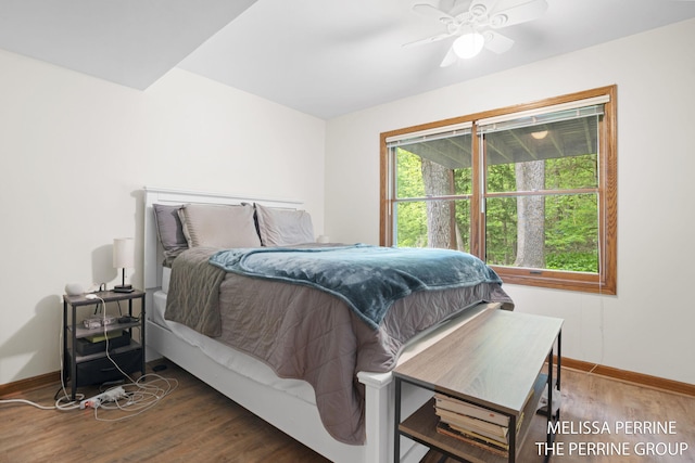 7359 Cascade Woods Dr SE, Grand Rapids, MI 49546 - bedroom featuring baseboards, wood finished floors, and ceiling fan