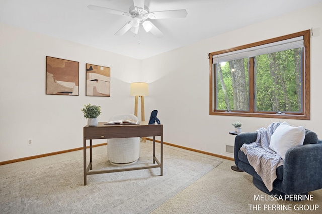 7359 Cascade Woods Dr SE, Grand Rapids, MI 49546 - carpeted home office featuring baseboards and a ceiling fan