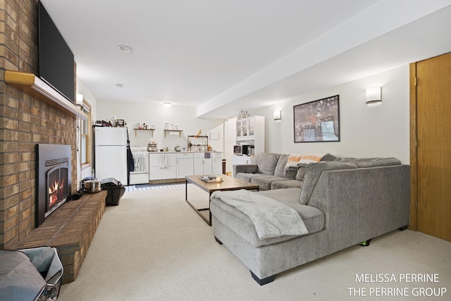 7359 Cascade Woods Dr SE, Grand Rapids, MI 49546 - carpeted living room with a fireplace