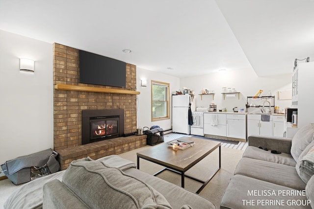 7359 Cascade Woods Dr SE, Grand Rapids, MI 49546 - living room with a brick fireplace and light carpet