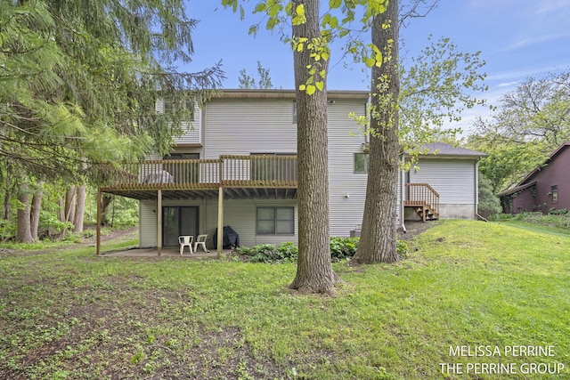 7359 Cascade Woods Dr SE, Grand Rapids, MI 49546 - rear view of property with a wooden deck, a yard, and a patio