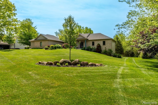 5502 E Alyssa Ct, White Lake, MI 48383 - view of front of house with a front lawn