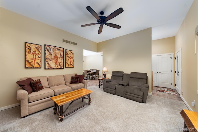 5502 E Alyssa Ct, White Lake, MI 48383 - living room featuring carpet flooring, a ceiling fan, and baseboards